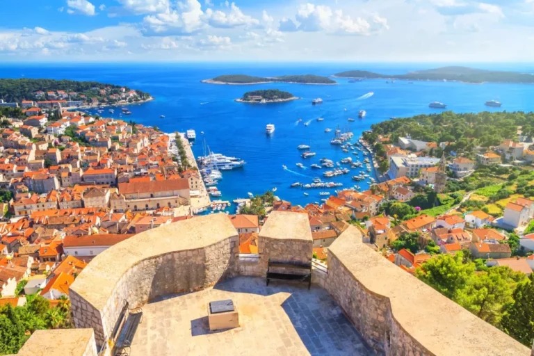 coastal summer landscape top view of the city harbour and marina of the town of hvar from the fortress on the island of hvar the adriatic coast of croatia
