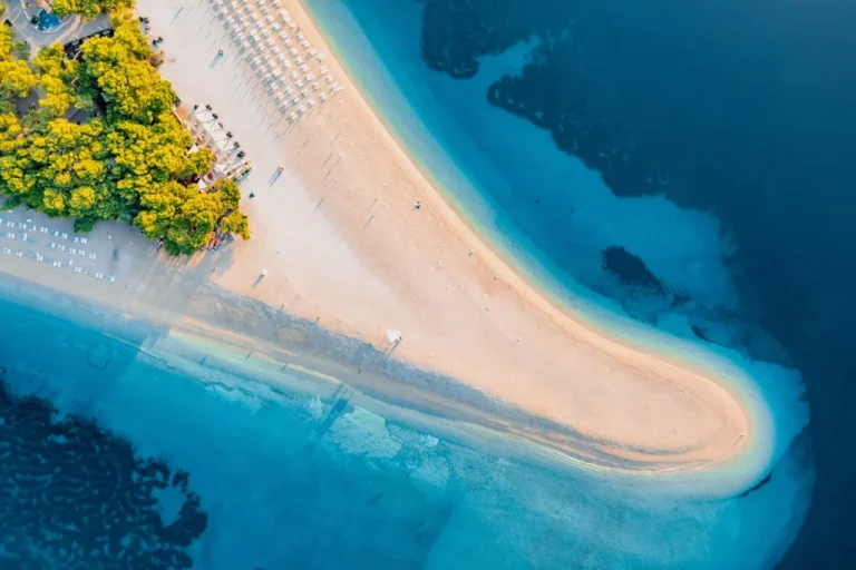 panoramic aerial view at the zlatni rat beach and sea from air famous place in croatia summer seascape from drone travel